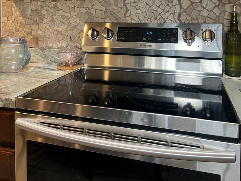 A spotless stainless-steel range after cleaning